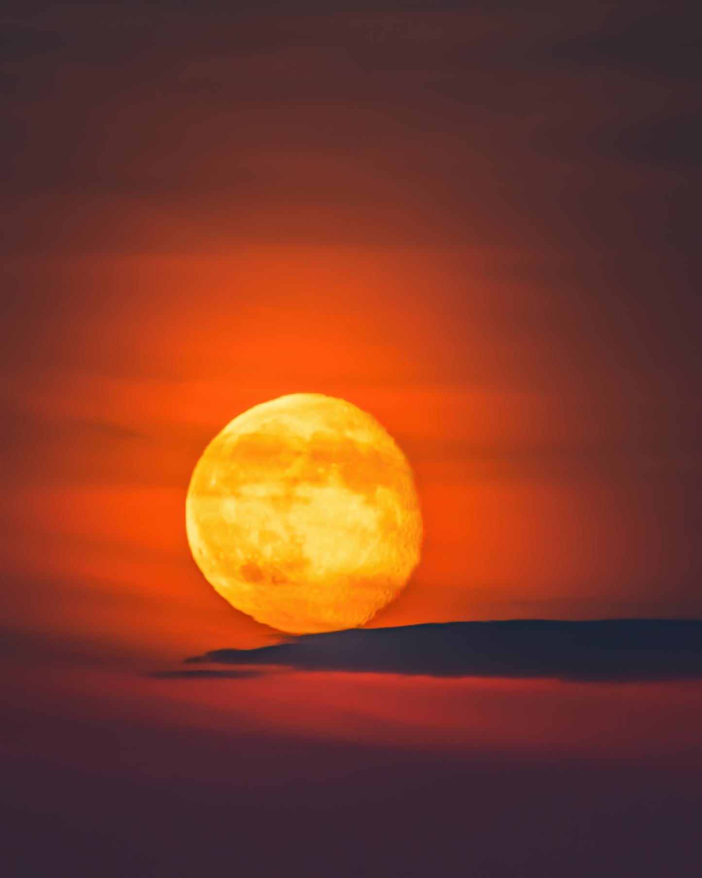 Beautiful Moon Resting on a Cloud.