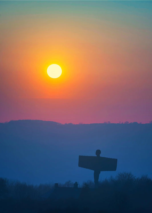 A lovely muted sun over the Angel of the North.