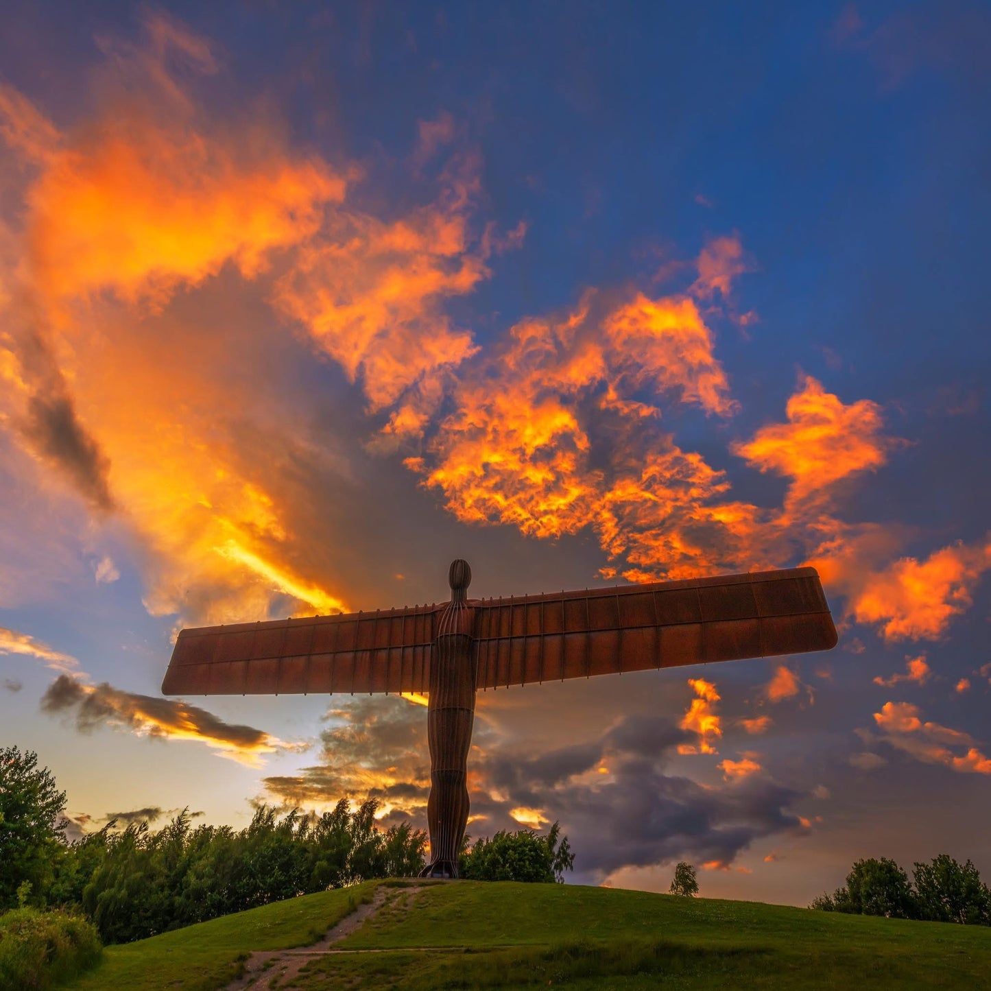 Golden clouds surrounding the Angel of the North.