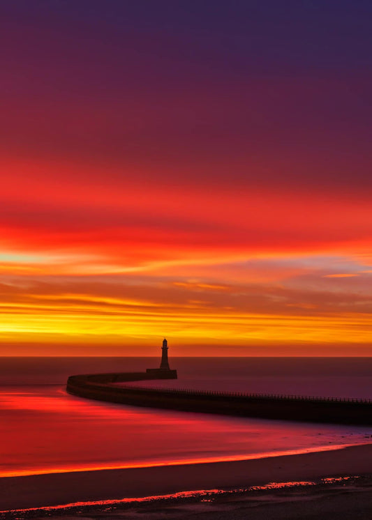 Stunning Roker sunrise colours.