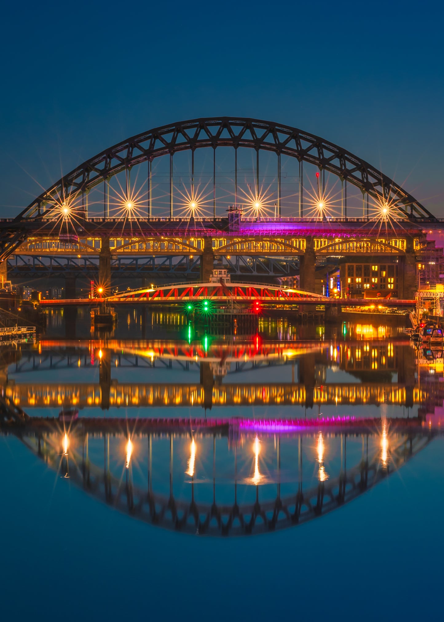 Beautiful Tyne Bridge reflections in the blue hour.