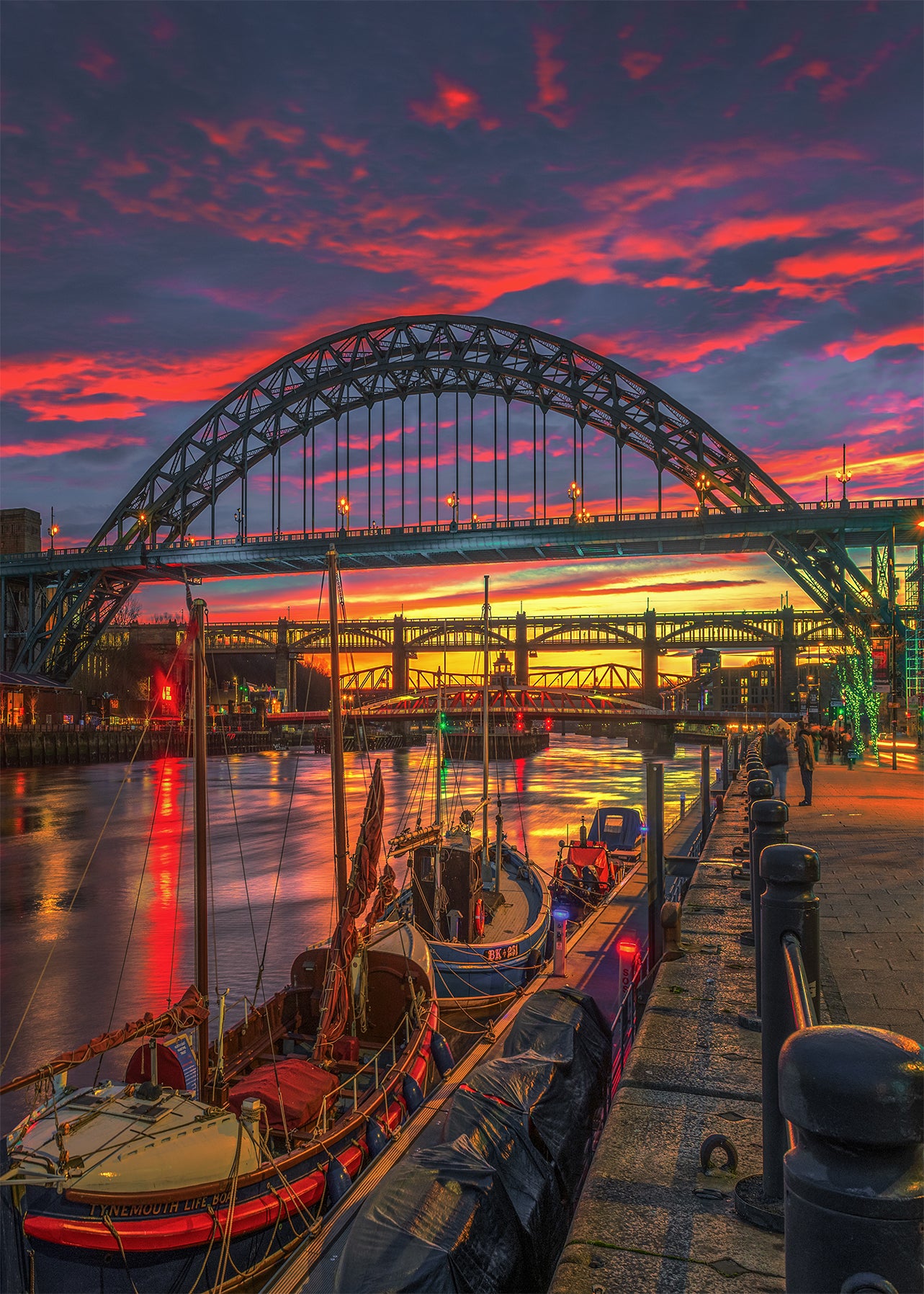 Boats, bridges and a beautiful sky.