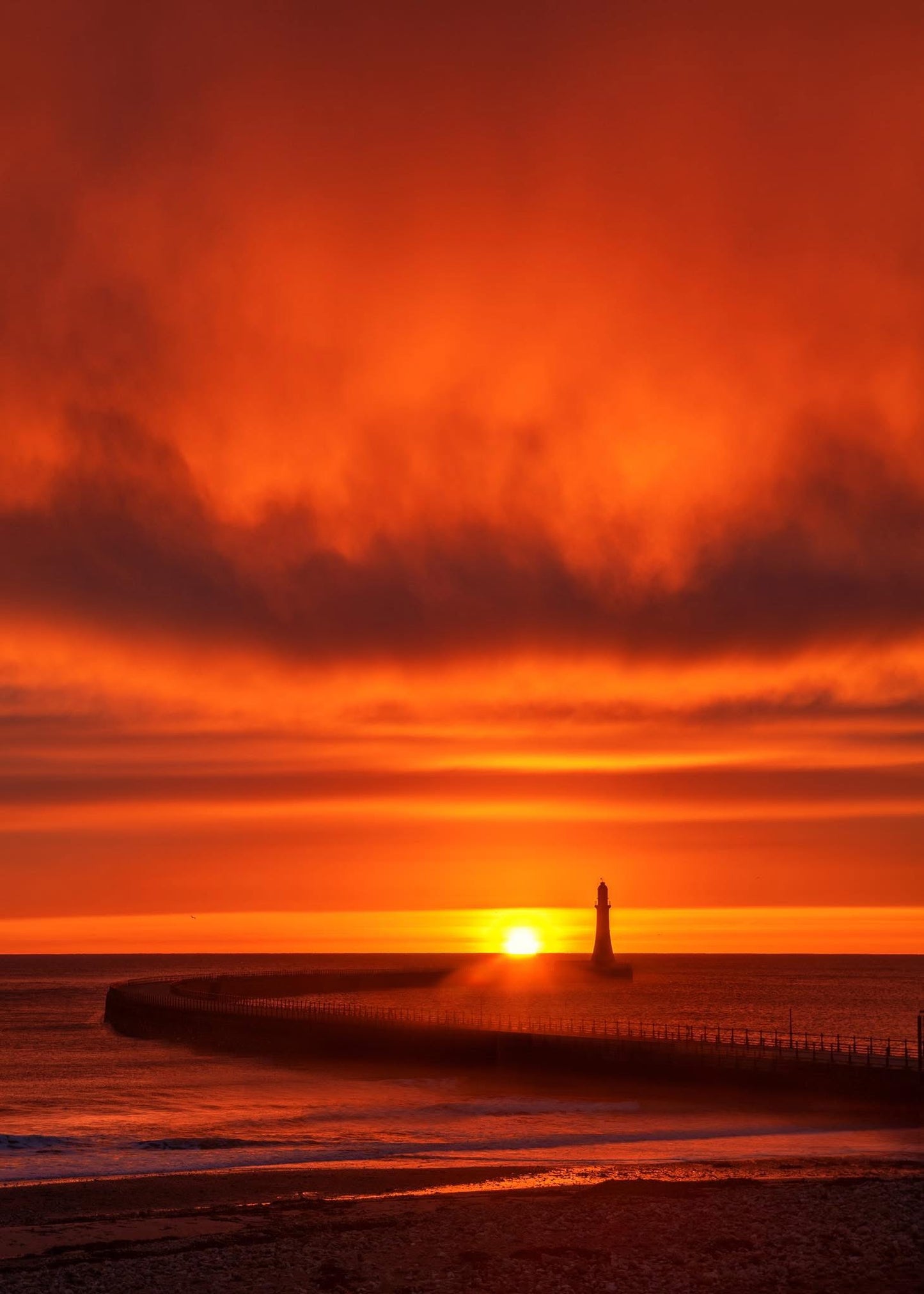 Dramatic glowing sunrise at Roker.
