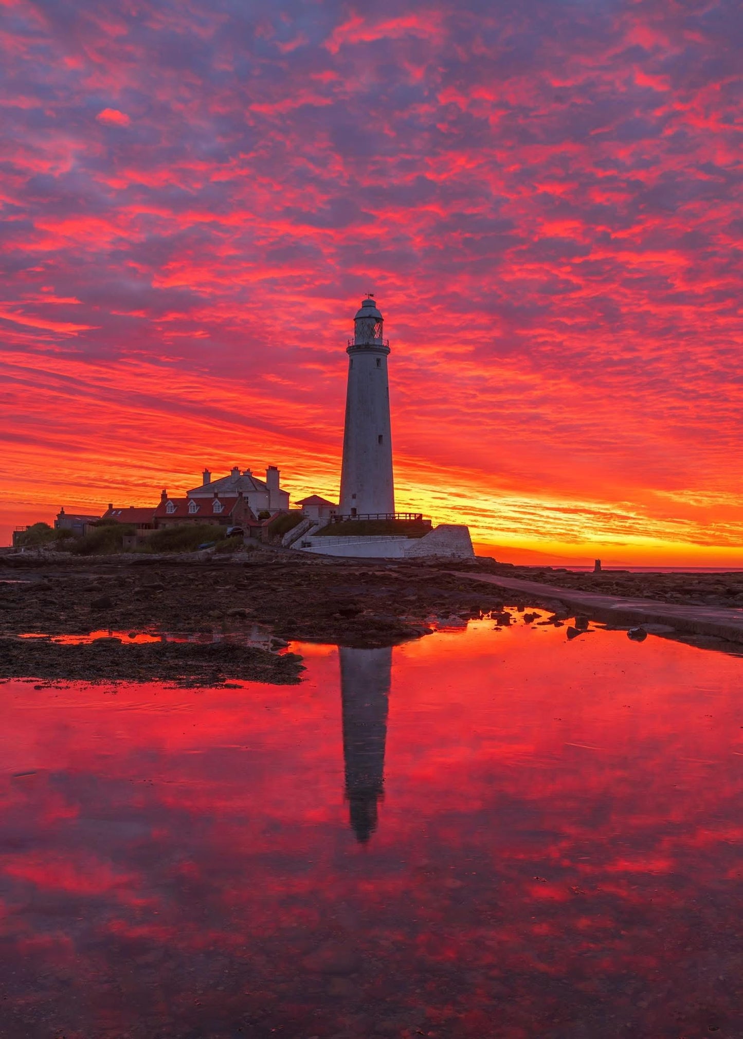 Beautiful pre sunrise sky and reflections at St. Mary's Lighthouse, Whitley Bay