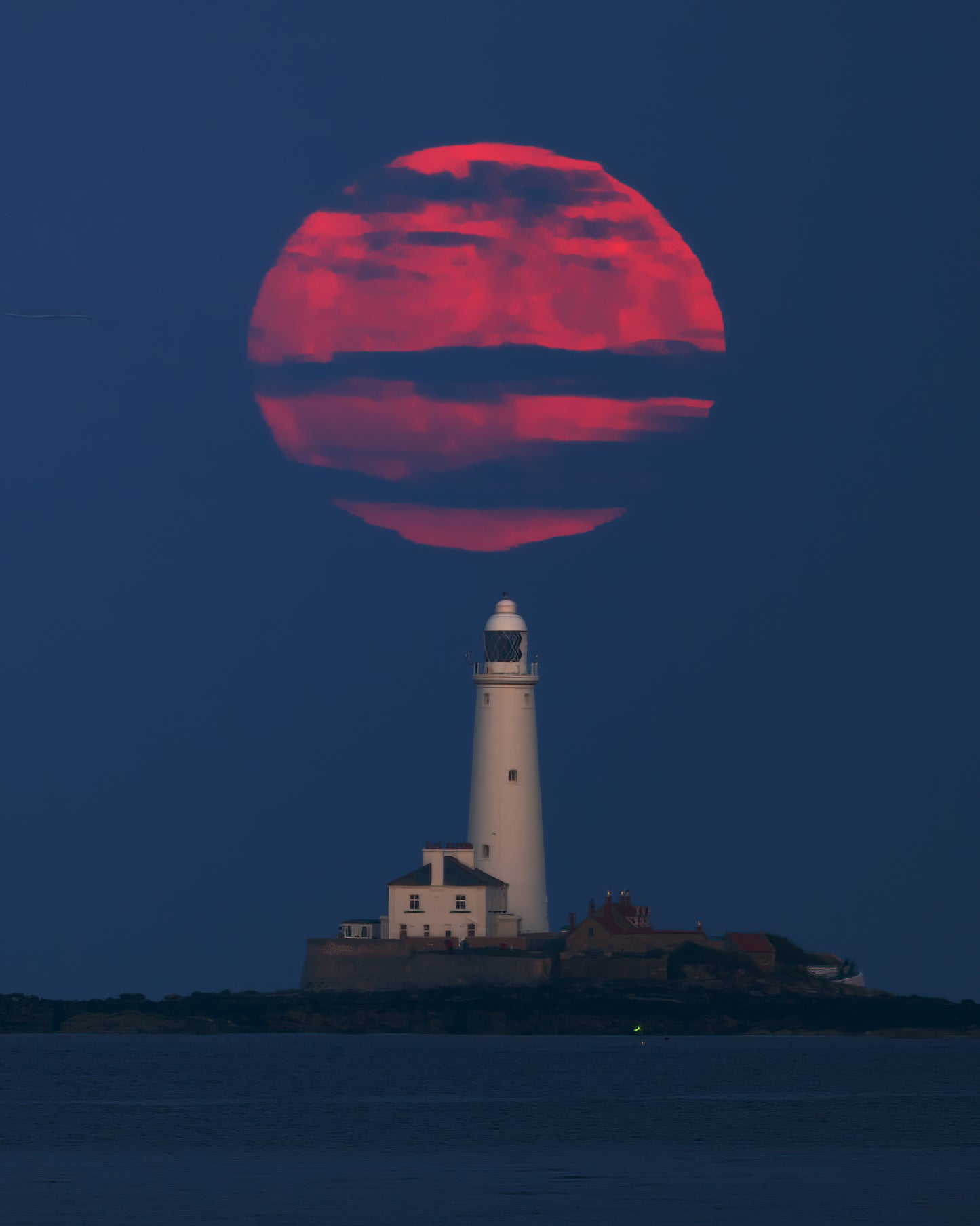 Strawberry Moon over St.Mary’s Lighthouse.