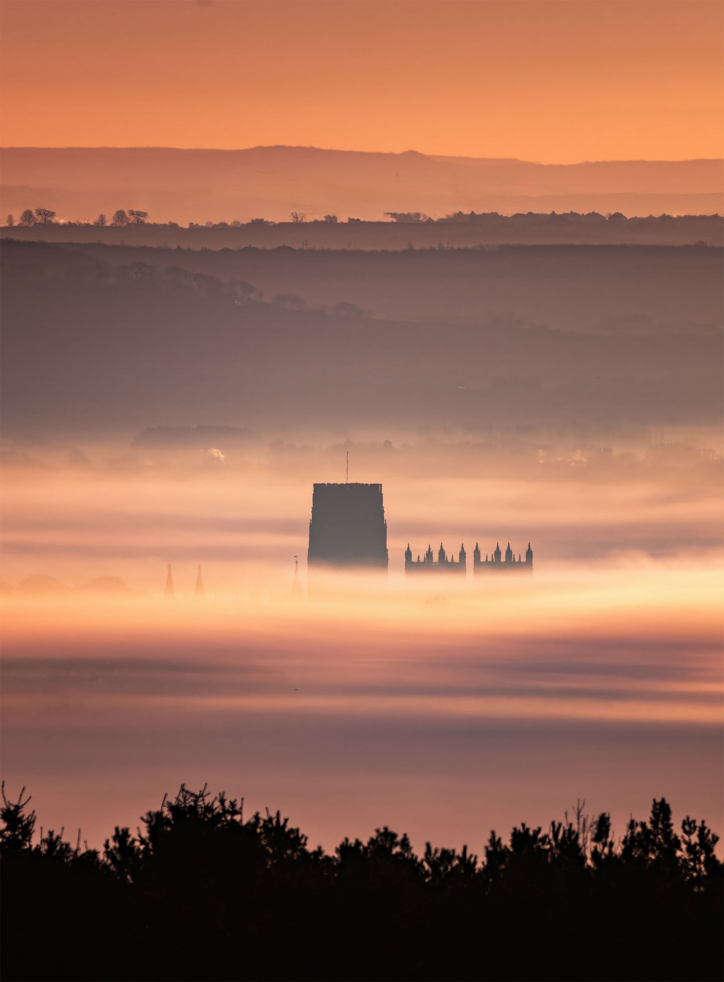 An almost buried Durham Cathedral in the mist.