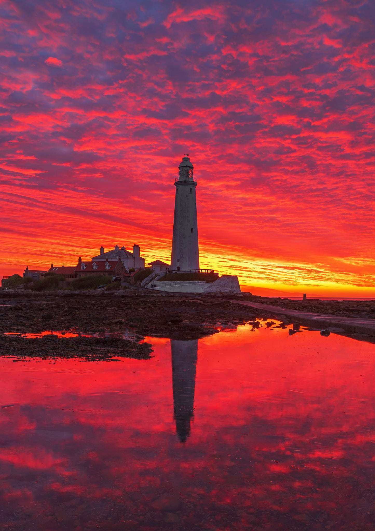 Beautiful pre sunrise sky and reflections at St. Mary's Lighthouse, Whitley Bay