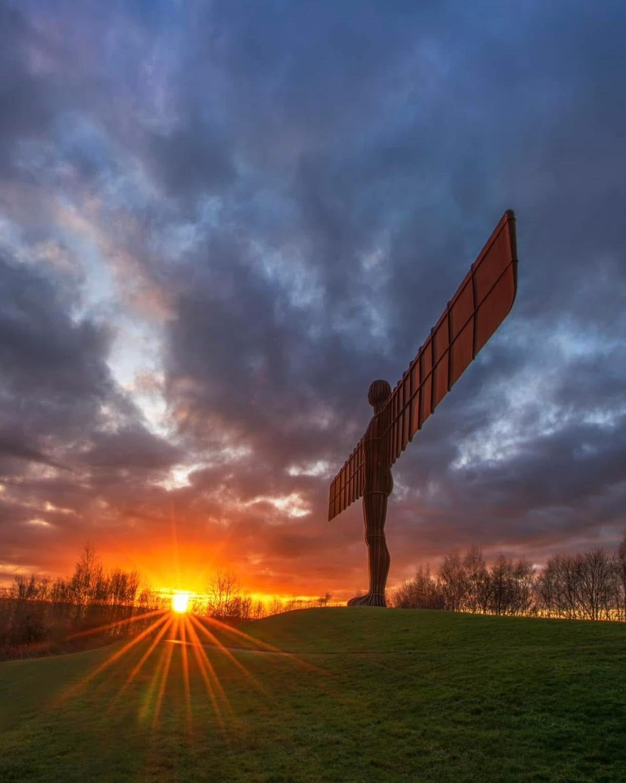 Angel of the North and the setting sun.