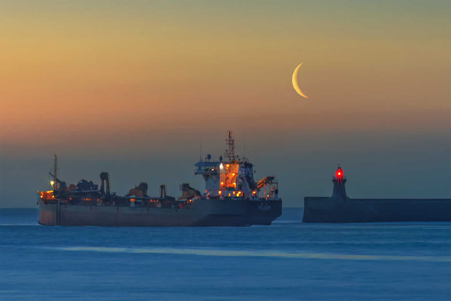 A fishing boat and a crescent moon above the lighthouse.