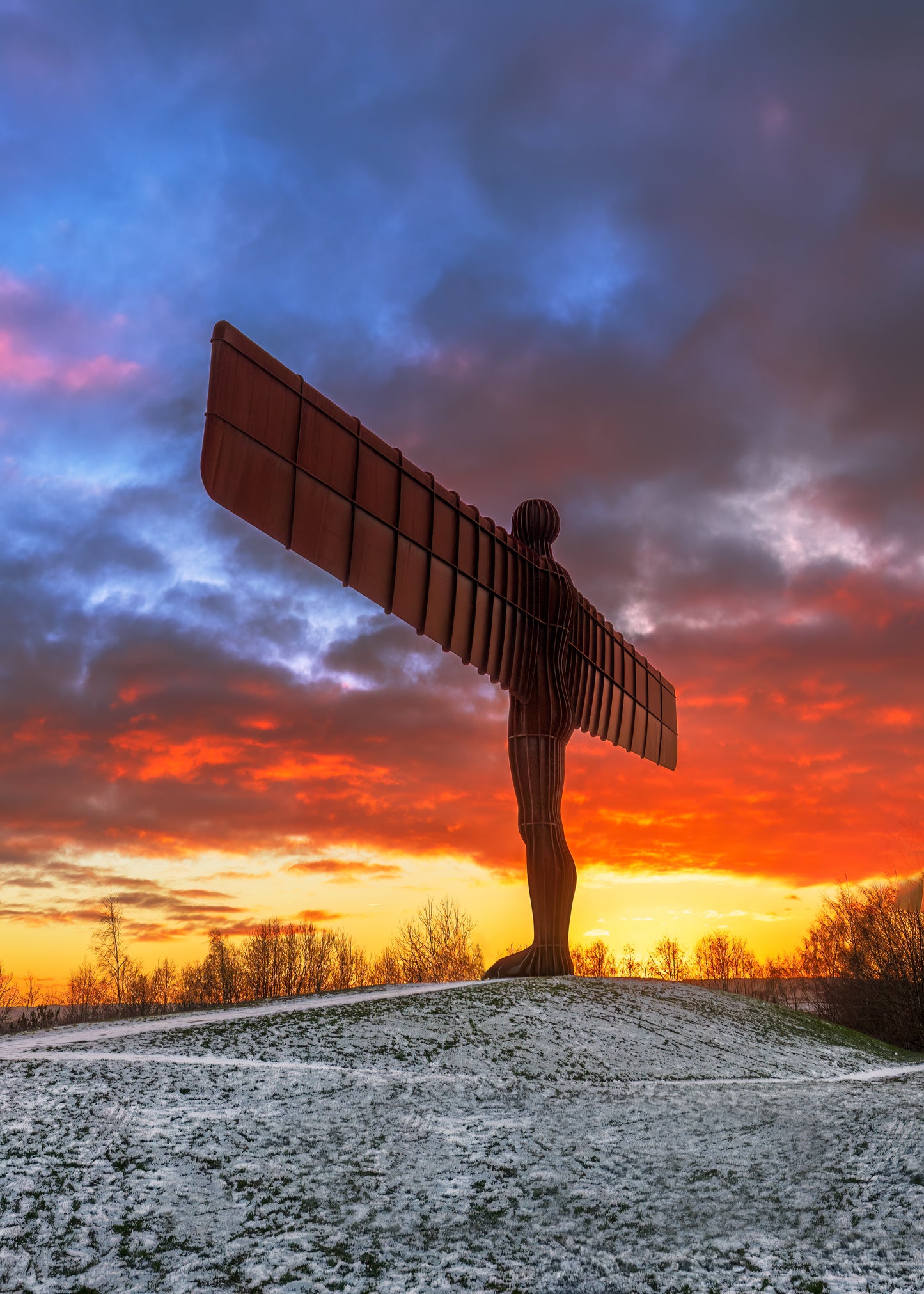 A beautiful Angel of the North Sunset in the snow.