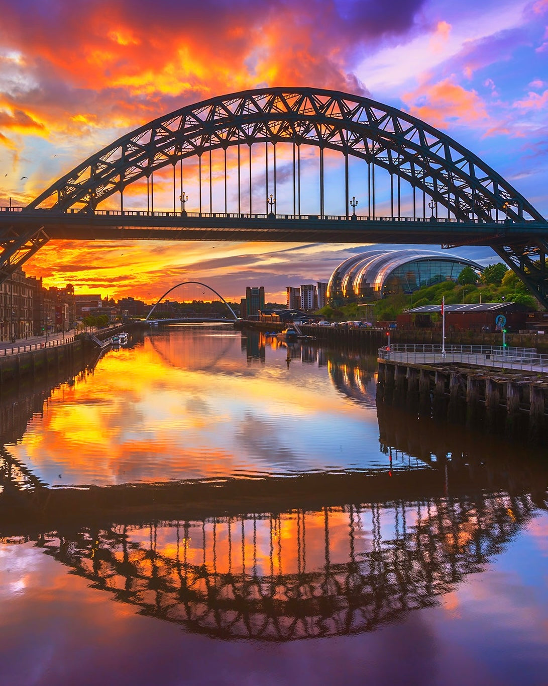 Full Tyne Bridge reflections at Sunrise portrait version.