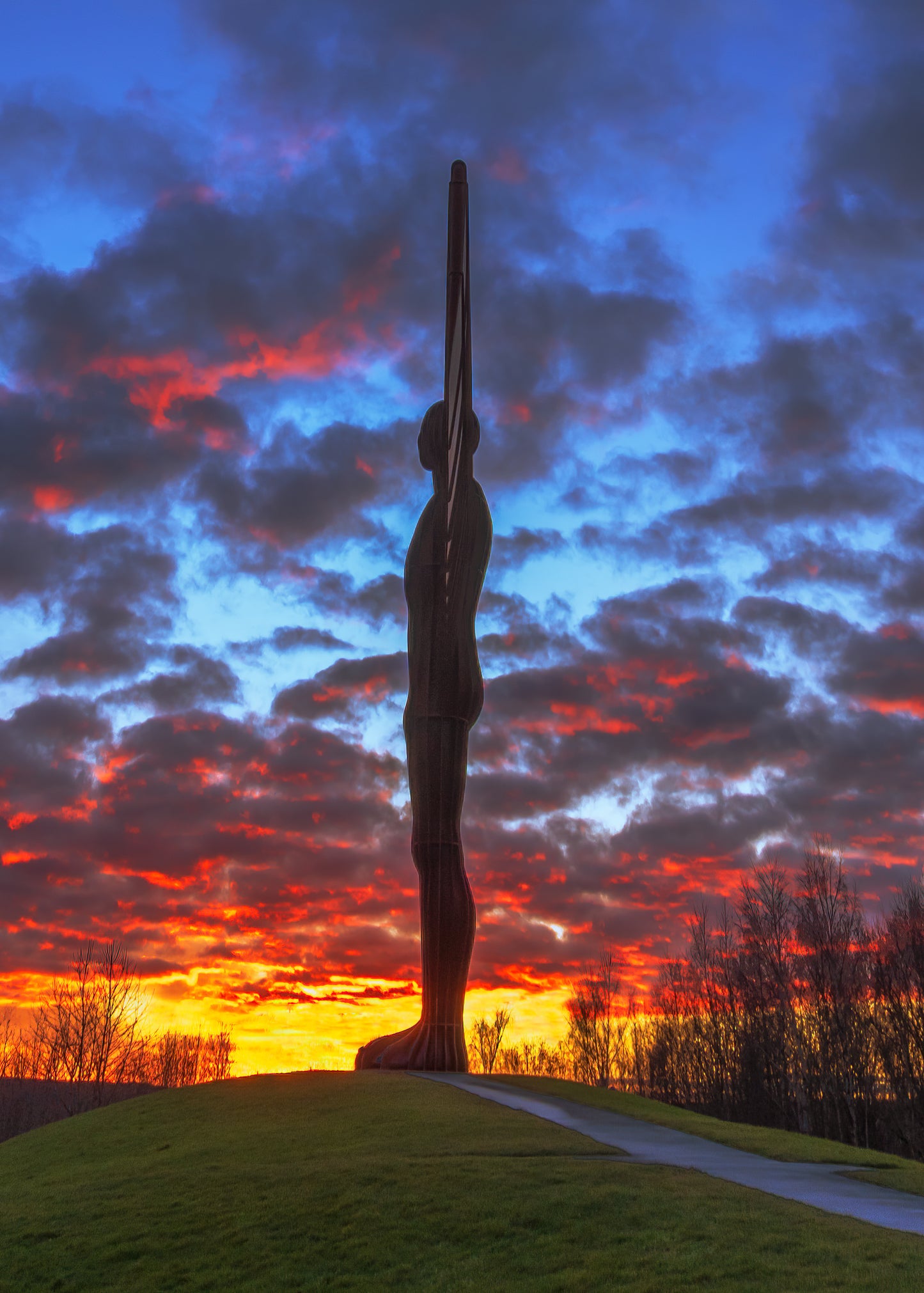 A vibrant sunset sky at the Angel of the North.