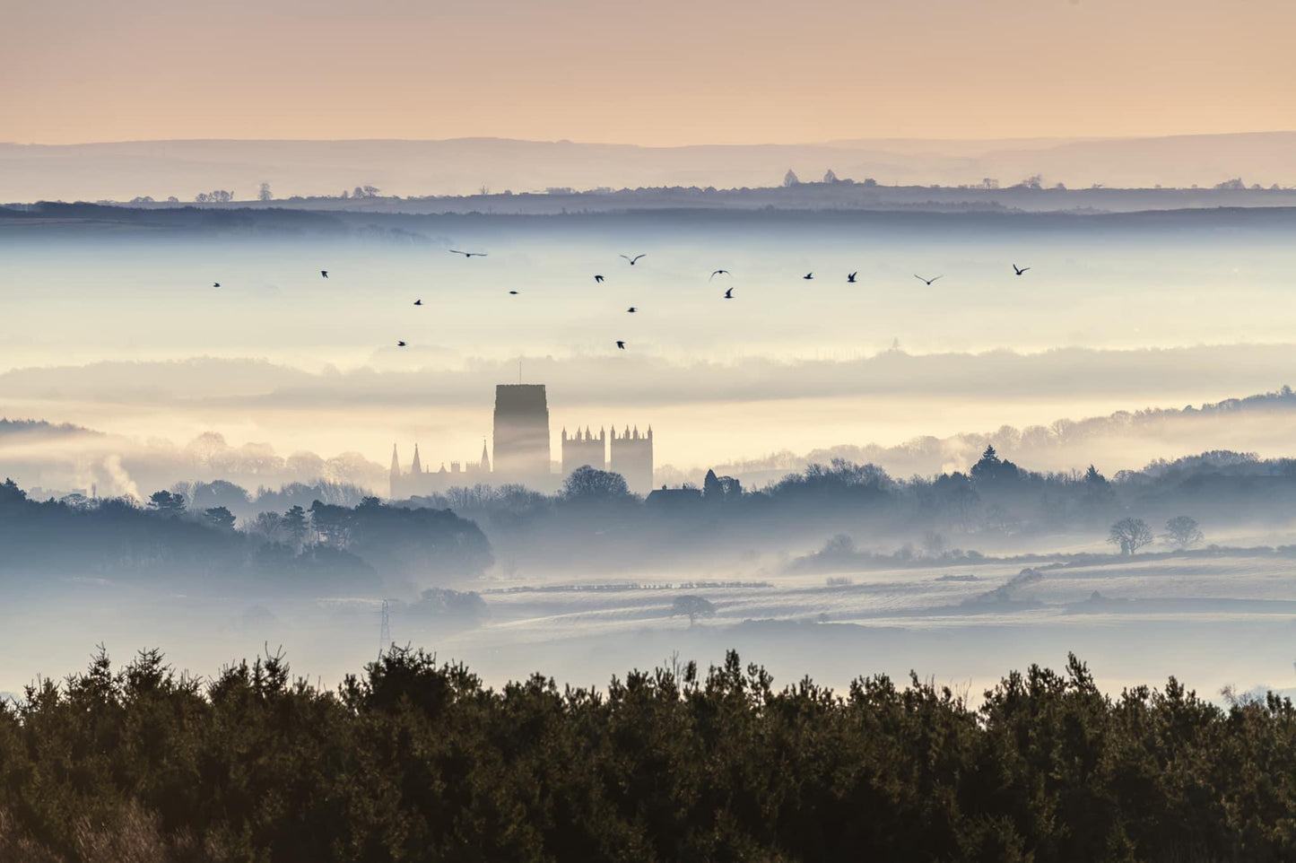 An ethereal misty scene looking towards Durham Cathedral.
