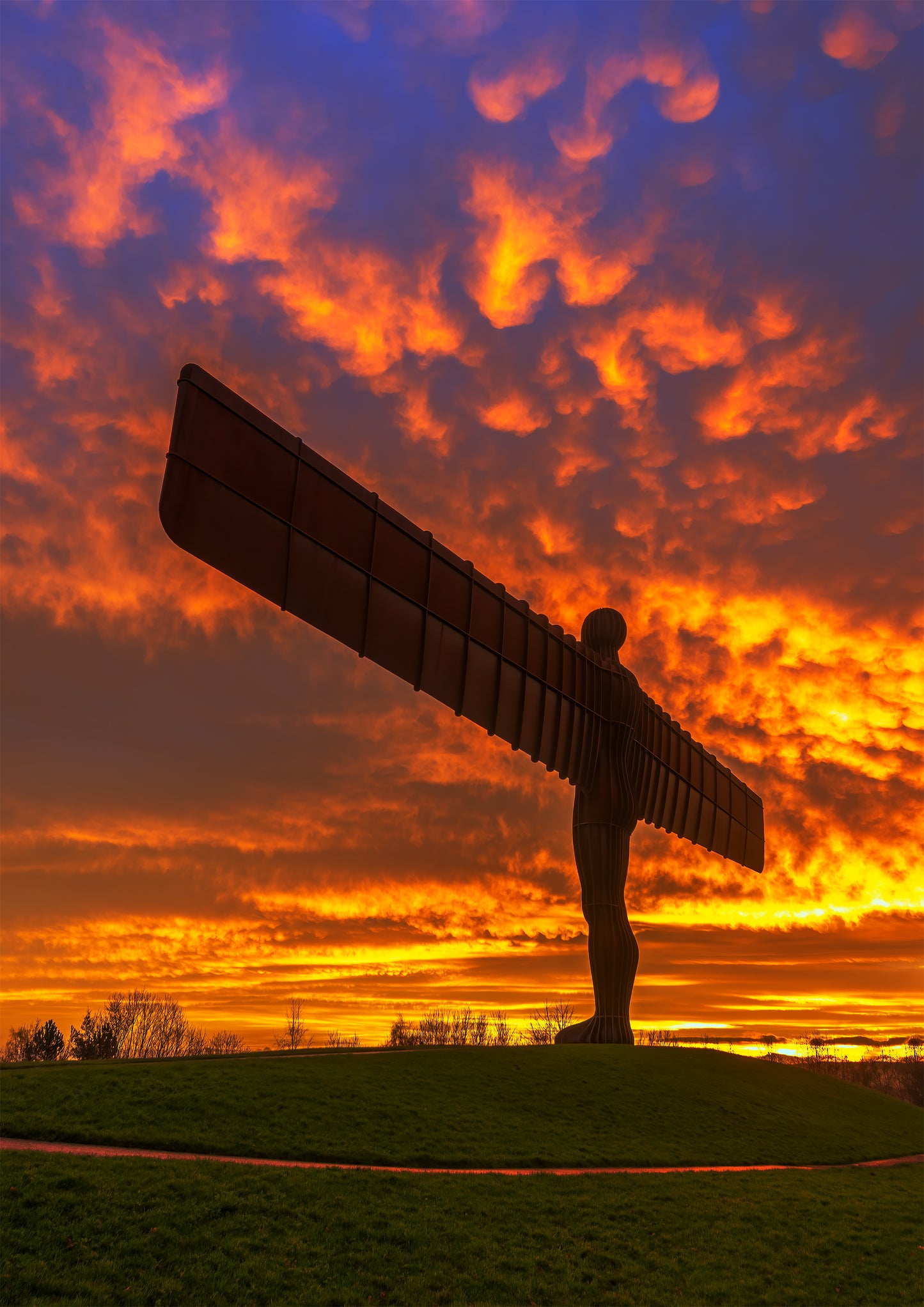 Stunning sunset fire sky at the Angel of the North.