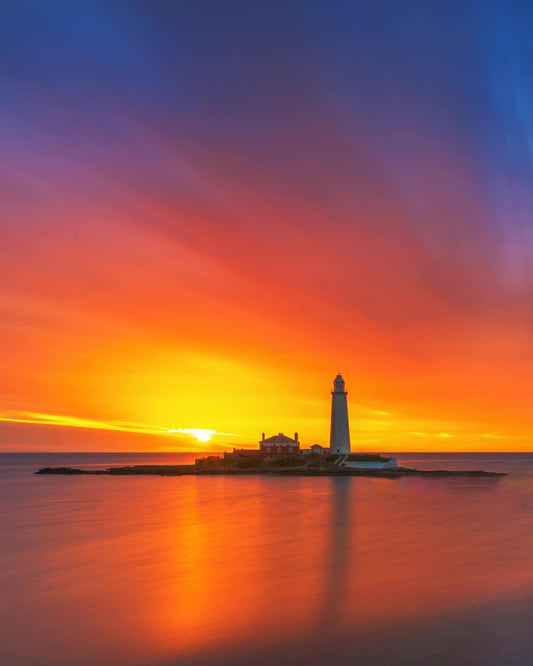 Vibrant sunrise at St. Mary’s Lighthouse.