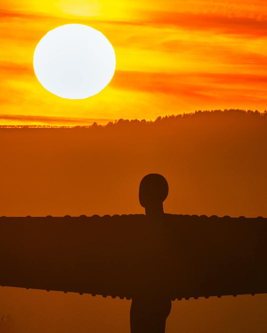 Angel of the North and the setting sun.