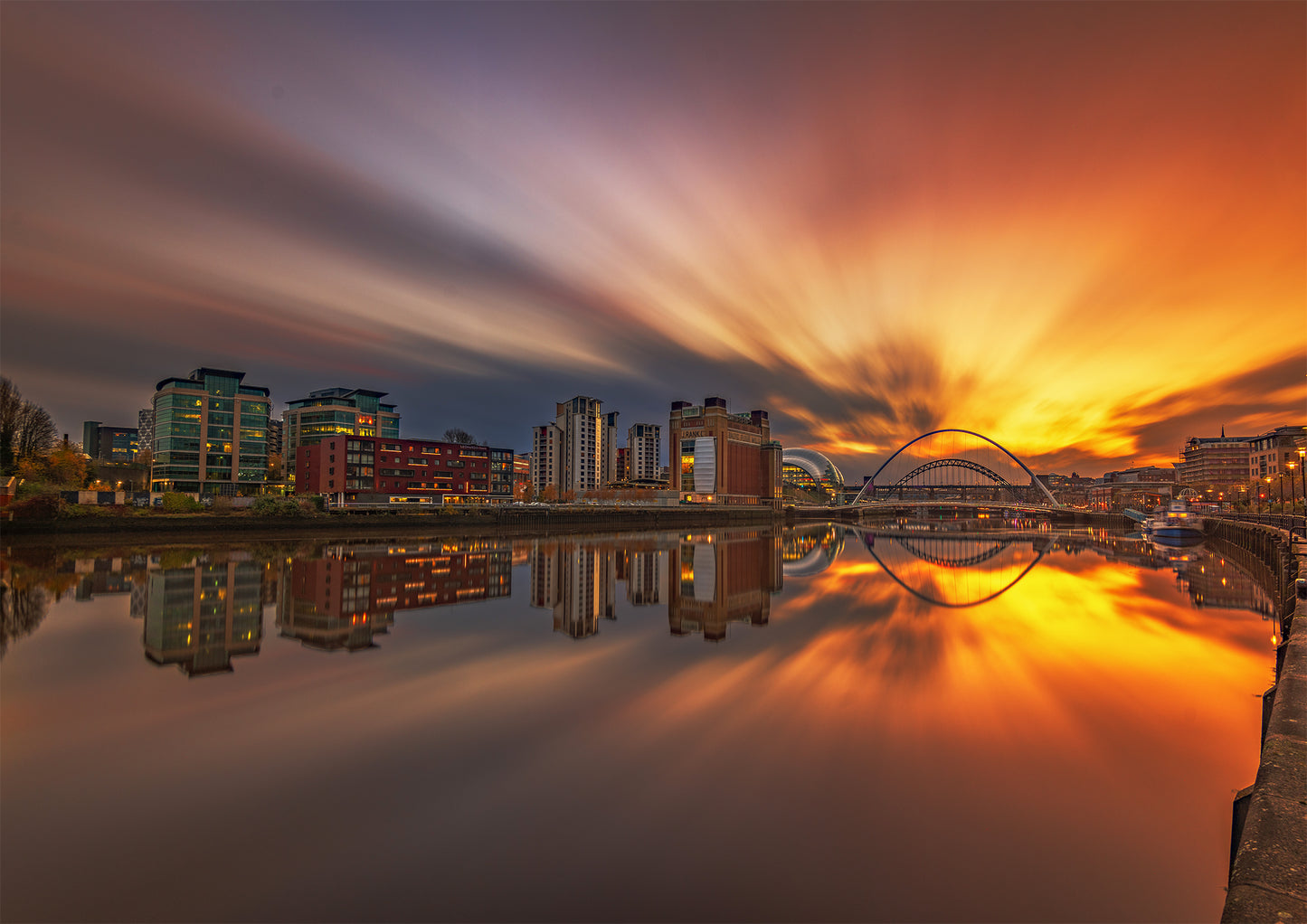 Yellow streaky sky across Newcastle Quayside.