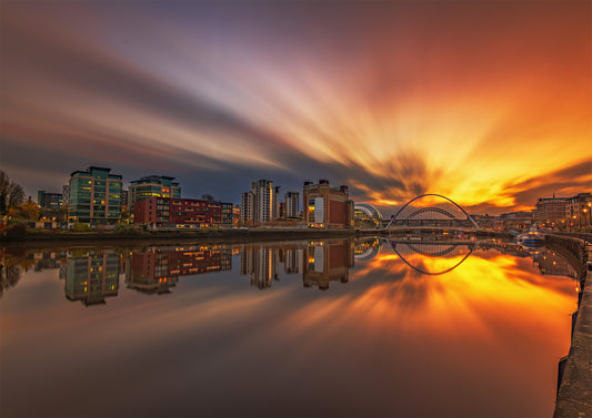 Yellow streaky sky across Newcastle Quayside.