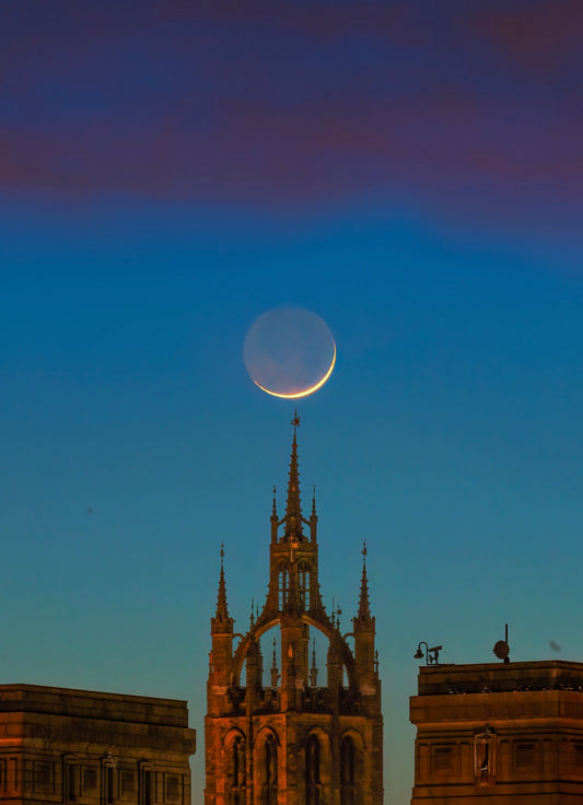 The new moon over St Nick’s in the blue hour.