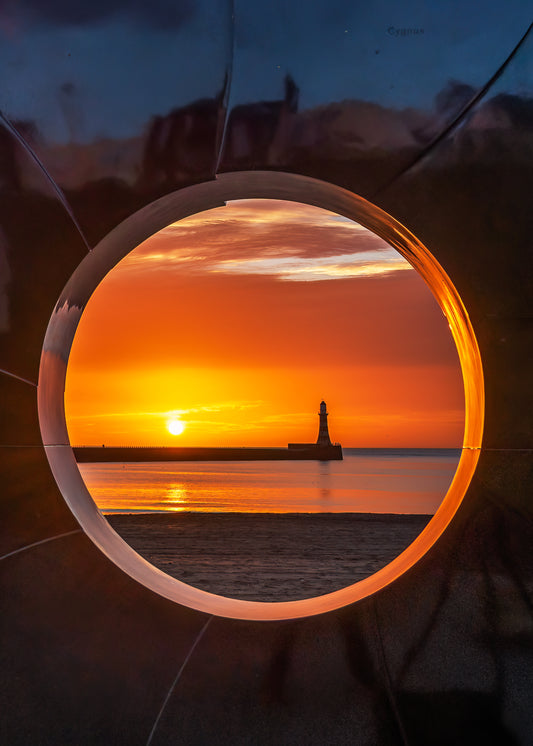 Roker Lighthouse through the porthole.