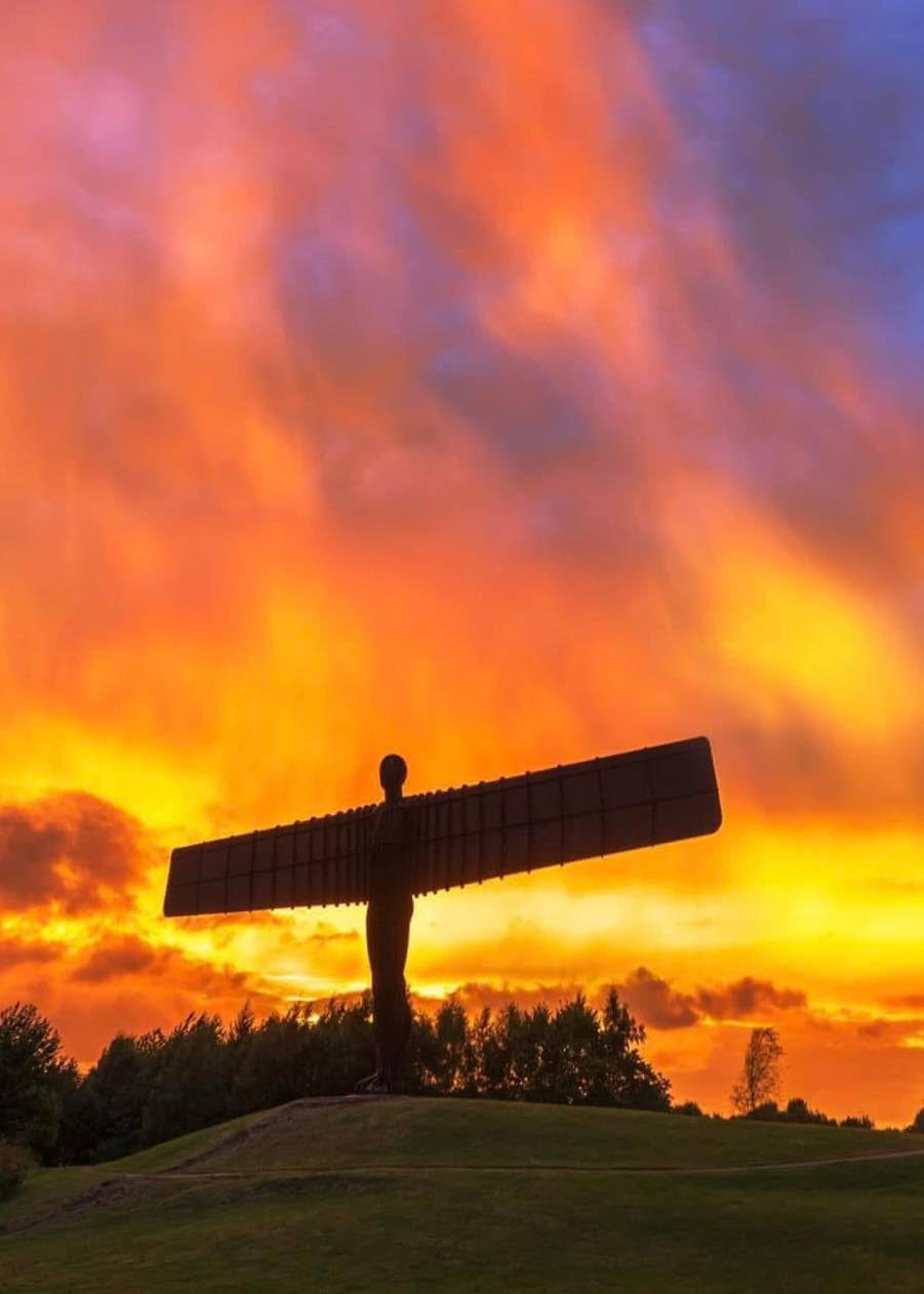 A golden Angel of the North Sunset.