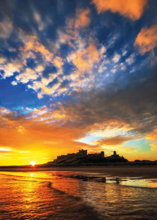 Glorious sunrise at Bamburgh Castle