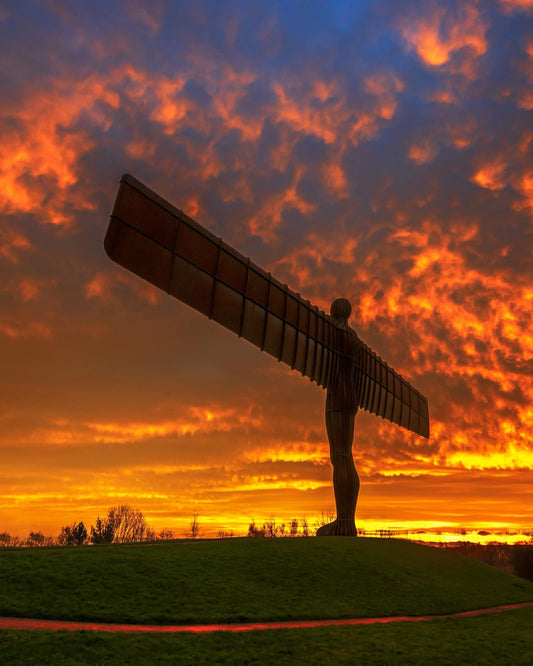 A stunning orange sky over the Angel of the North.