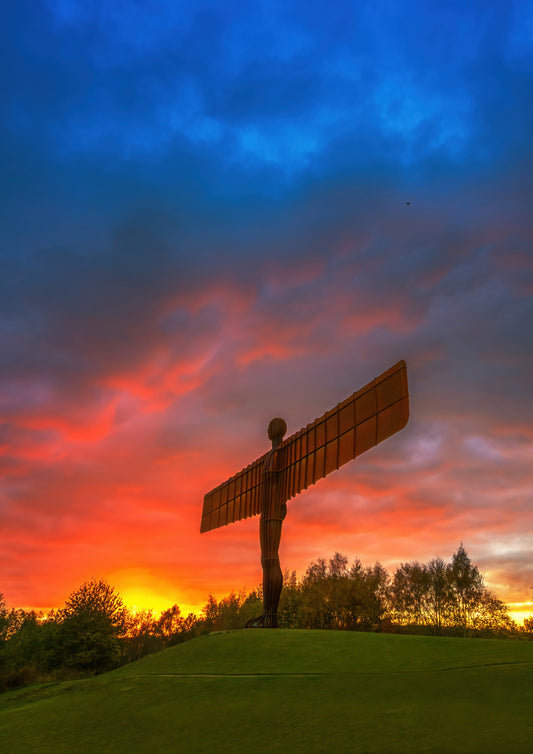 A vibrant sunset at the Angel of the north.