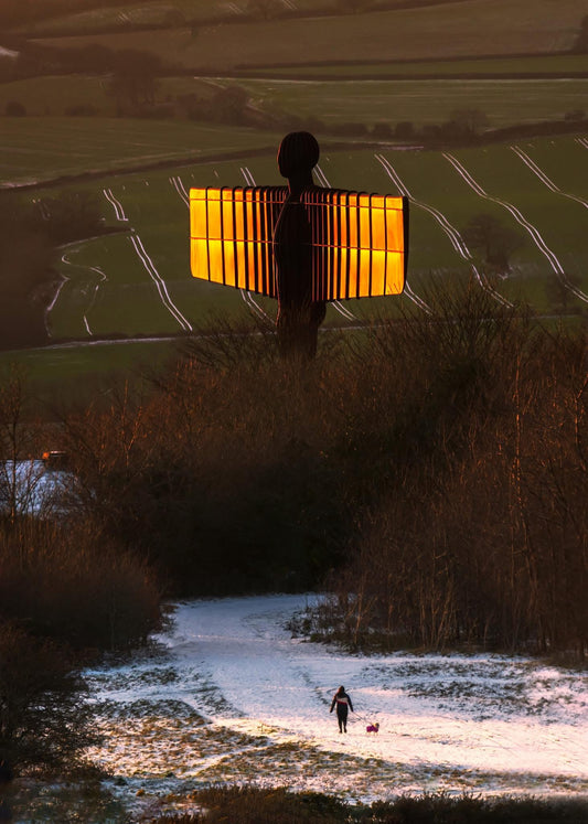 A snowy view of the Angel of the North