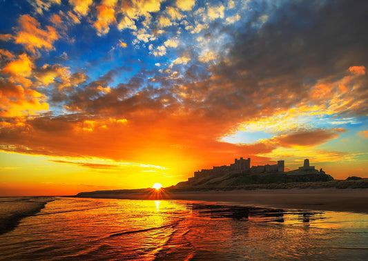 A beautiful sunrise at Bamburgh Castle.