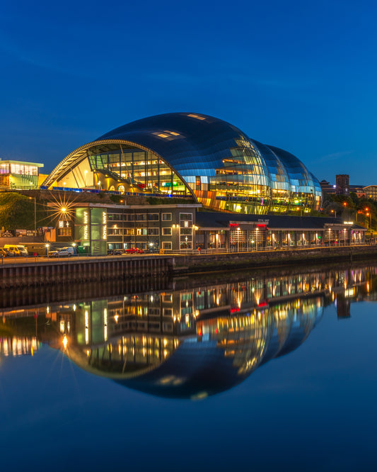 The Glass house reflecting perfectly in the Tyne.