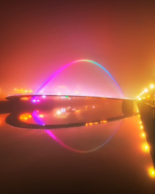 Cyberpunk vibe of Millennium Bridge in the fog.