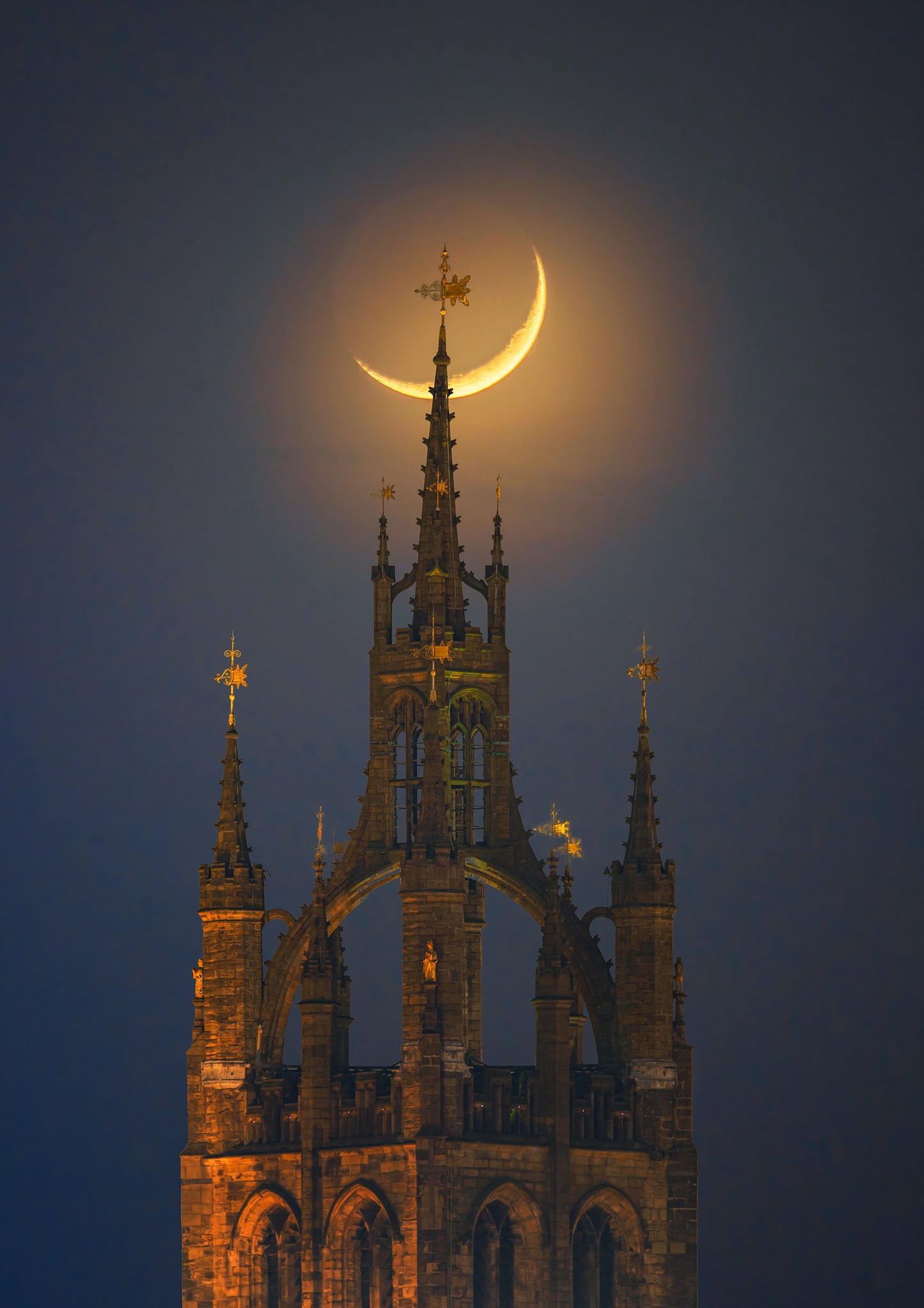 A pretty crescent moon setting over Newcastle Cathedral.