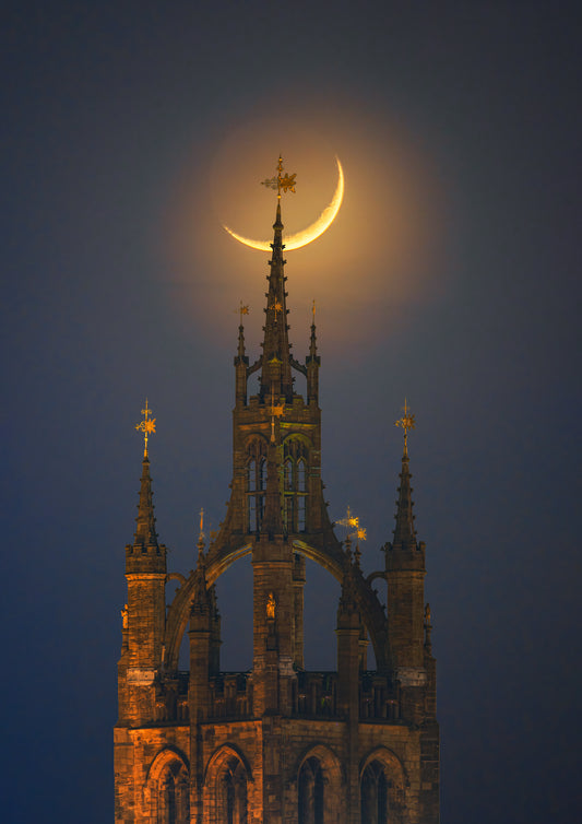A pretty crescent moon setting over Newcastle Cathedral.