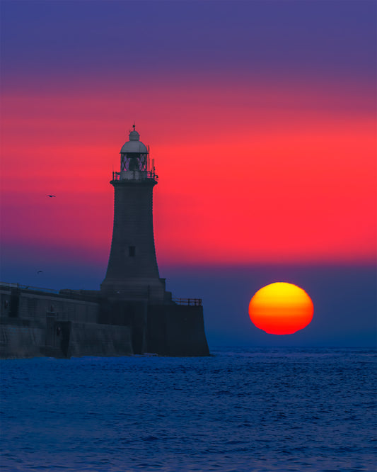 Beautiful muted sun by Tynemouth Lighthouse.