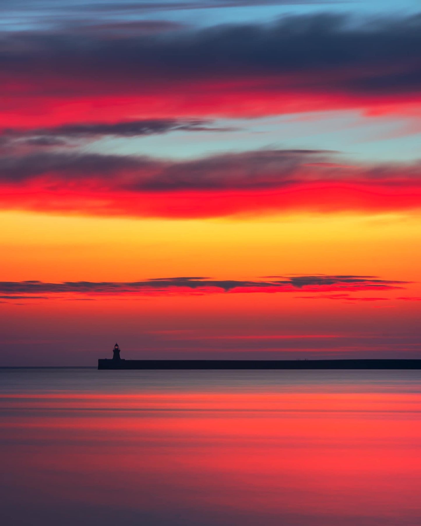 Layers of colour at sunrise looking towards South Shields Lighthouse.