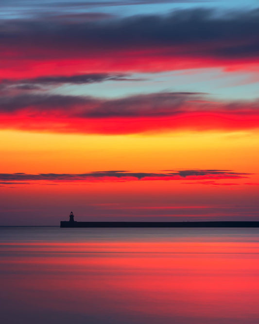 Layers of colour at sunrise looking towards South Shields Lighthouse.