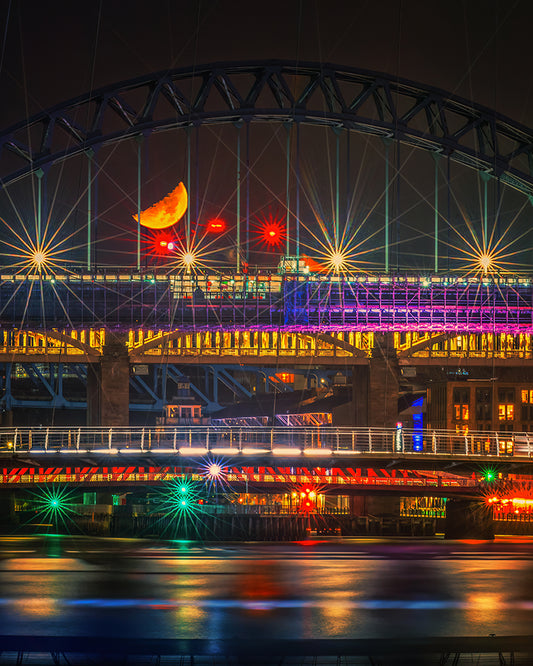Stunning Crescent moon behind Tyne Bridge in Newcastle.