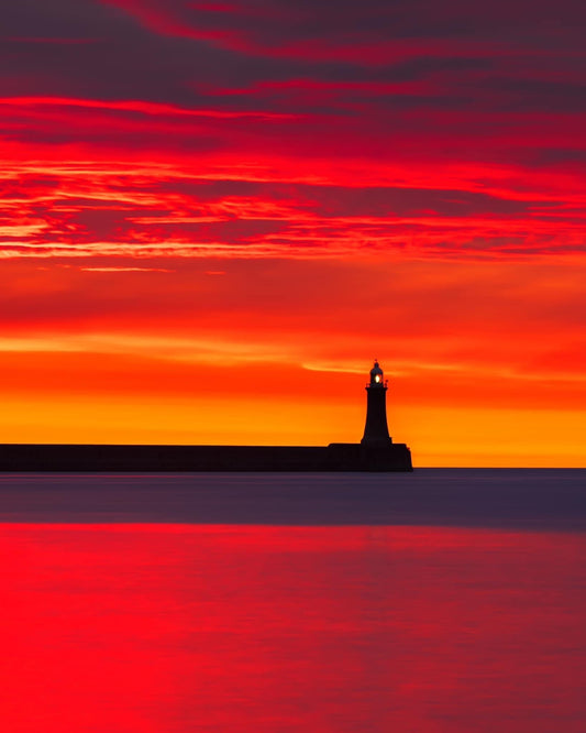 Long Exposure of a beautiful sunrise over Tynemouth Lighthouse.