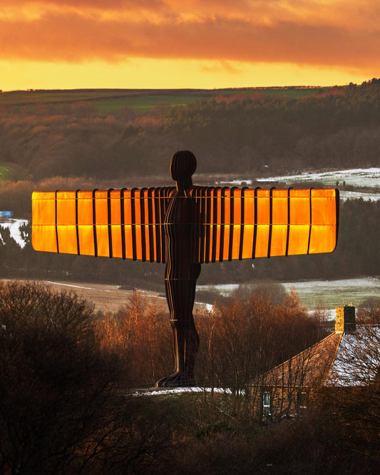 Glowing Angel wings in the winter sunset.