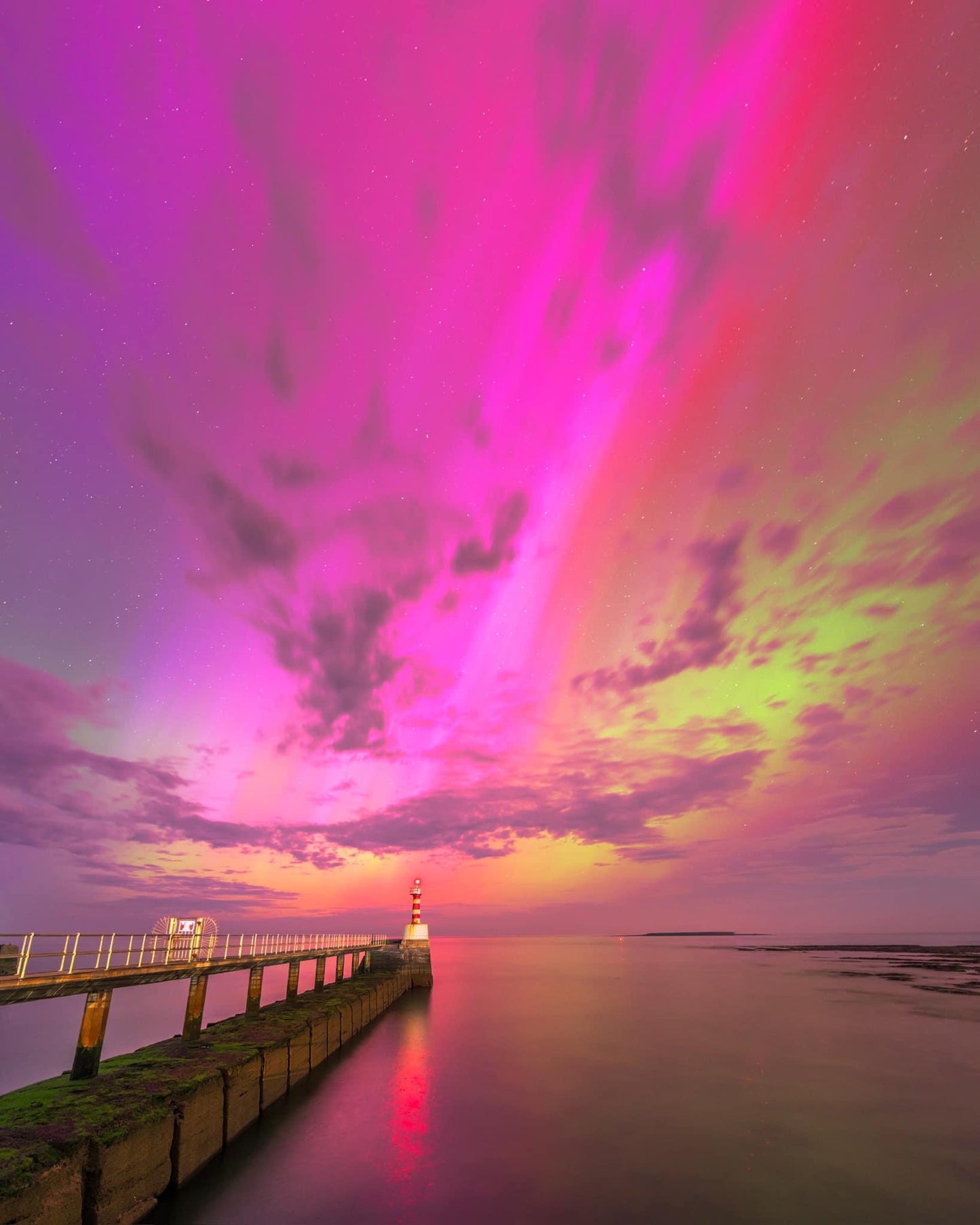 Wonderful aurora at Amble Lighthouse.