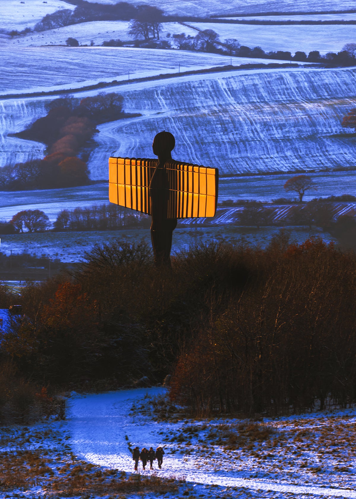 A snowy view of the Angel of the North.