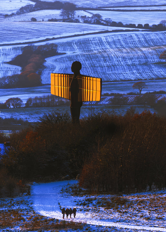 A snowy view of the Angel of the North.
