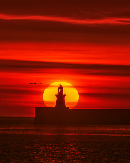 Beautiful sunrise over South Shields lighthouse.