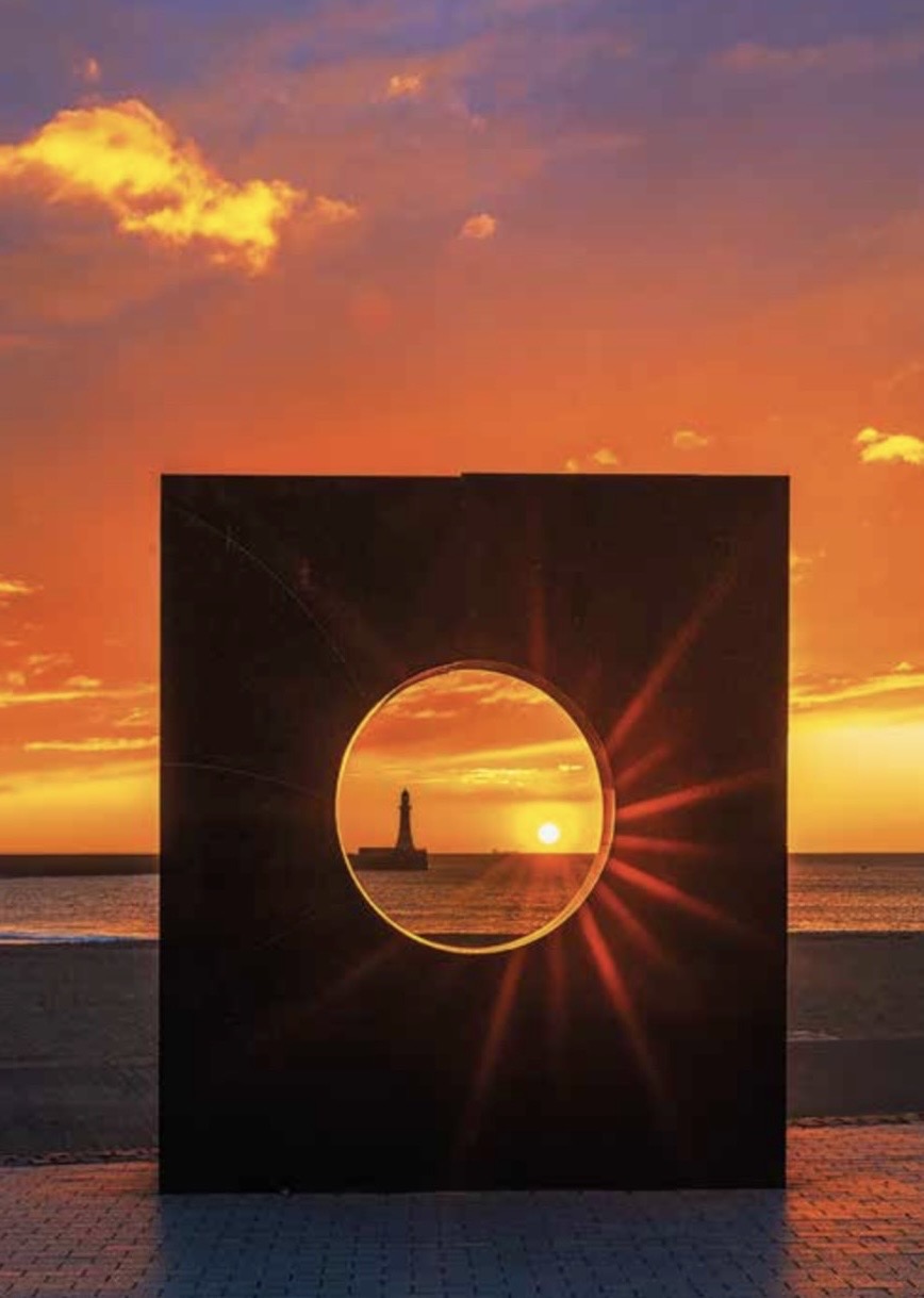 Roker Sunrise through the Porthole.