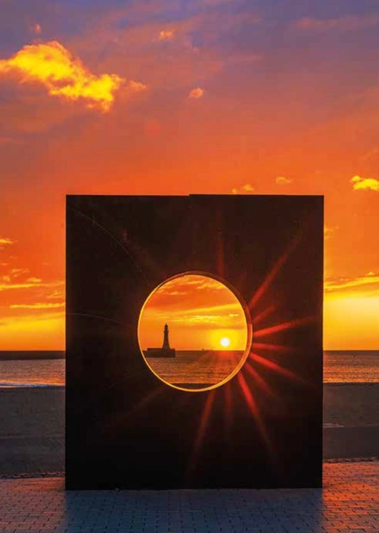 Roker Sunrise through the Porthole.