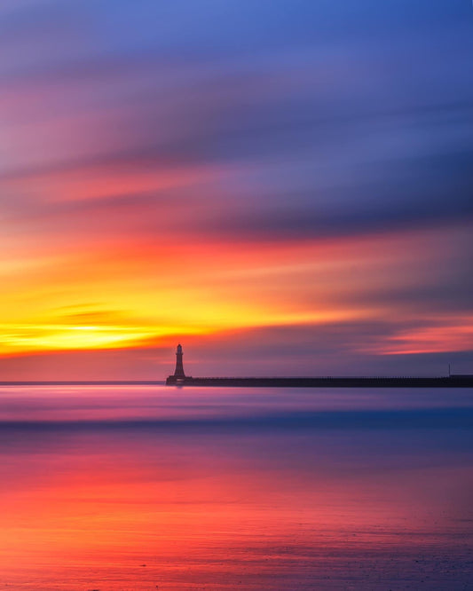 Long exposure of a colourful sky at Roker.