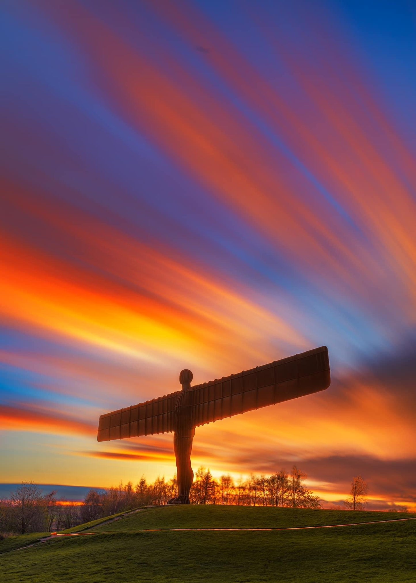 Streaky sunset clouds at the Angel of the North.