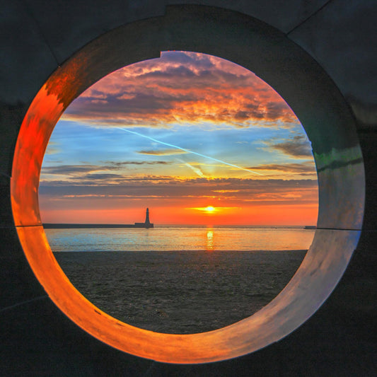 Sunrise through the Roker Porthole