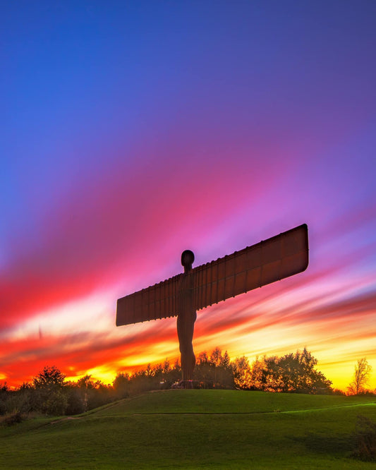 A colourful long exposure of the Angel at Sunset.